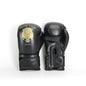Boys Muay Thai Boxing Training With A Punching Bag And Gloves