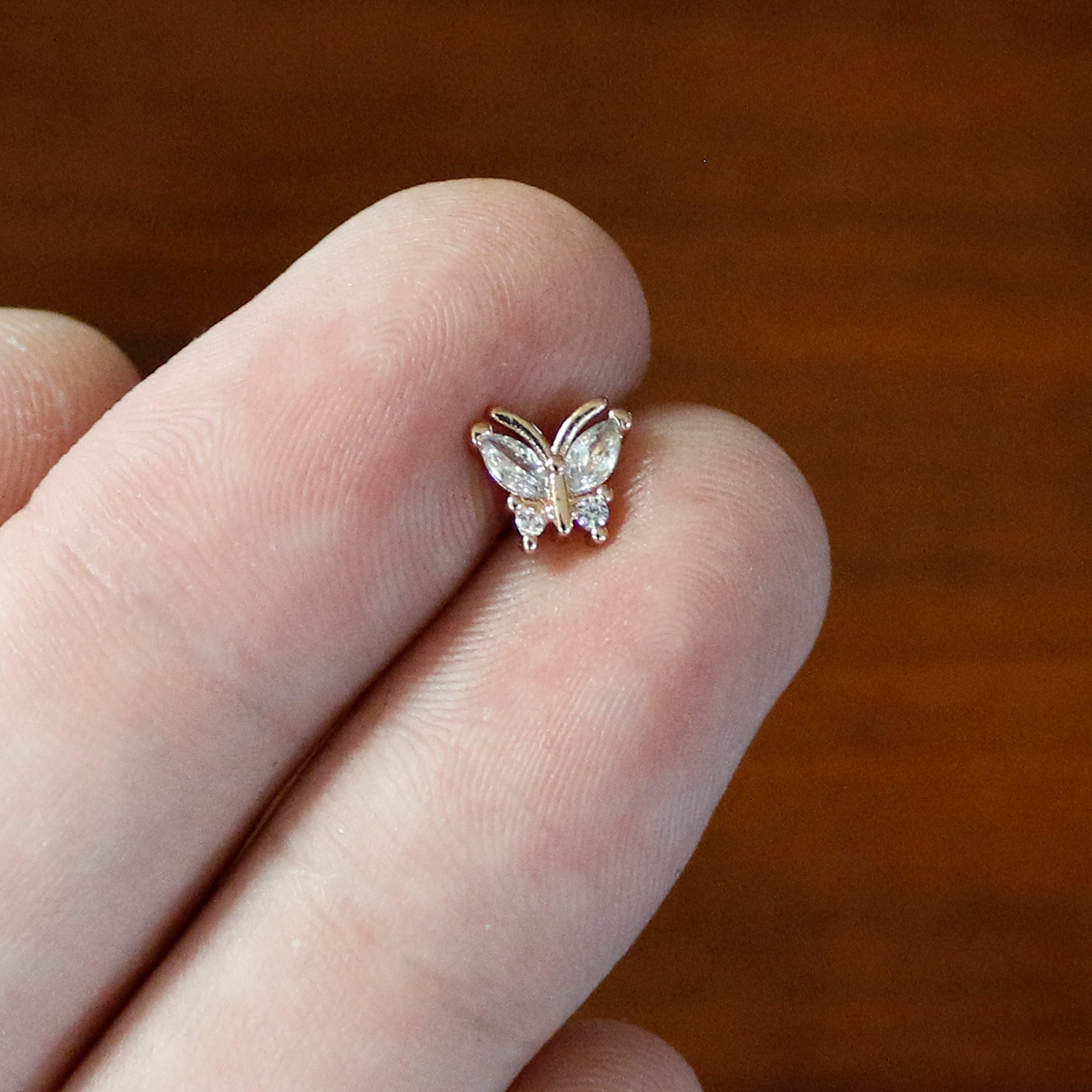 16G 1/4 Clear CZ Gem Rosy Hue Internal Thread Butterfly Labret