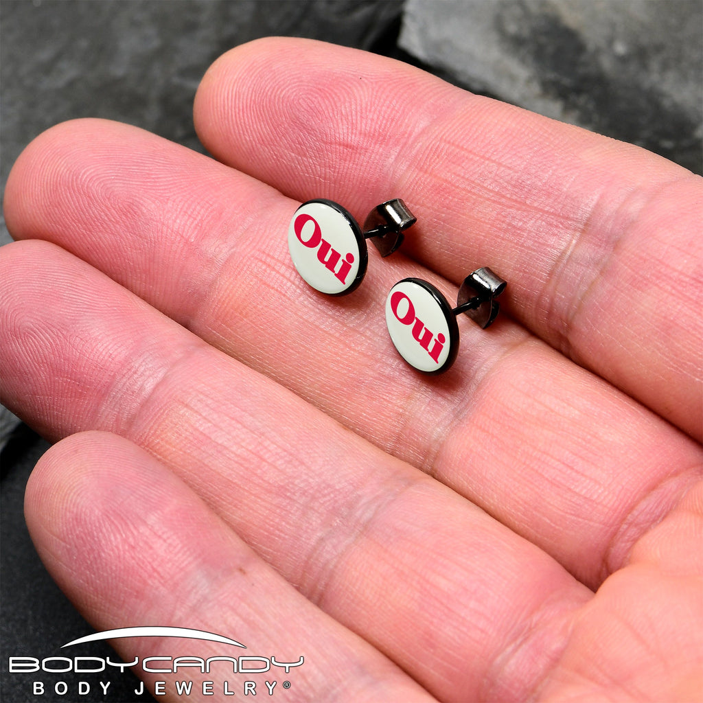 Black Anodized OUI Glow in the Dark Stud Earrings by Onyx O
