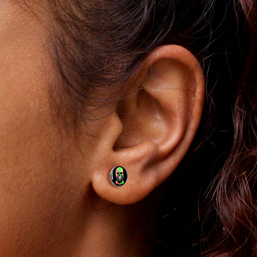 Ultra Bright Melting Skull Stud Earrings by Onyx O