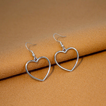 Hollow Peach Heart Stud Earrings
