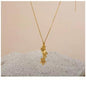 triangle forget me not necklace