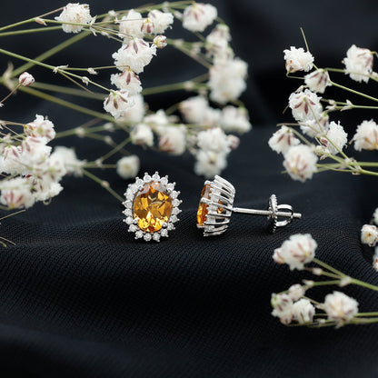 Oval Shaped 2.2 Carat Citrine Stud Earrings with Halo