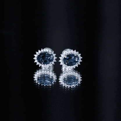 2.2 Carat Oval London Blue Topaz Stud Earrings with Moissanite Halo