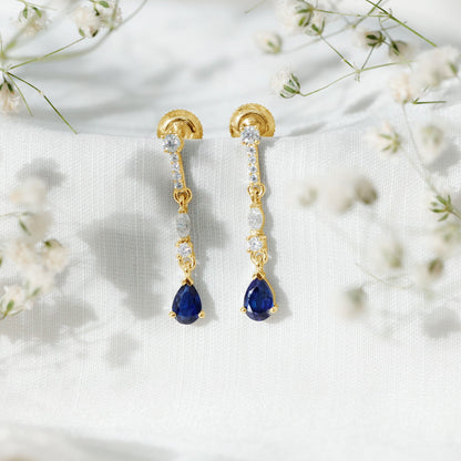 Pear Cut Created Blue Sapphire and Moissanite Long Dangle Earrings