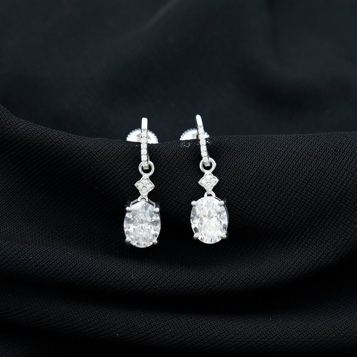 Oval Cut Lab Grown Diamond Dangling Earrings For Bride