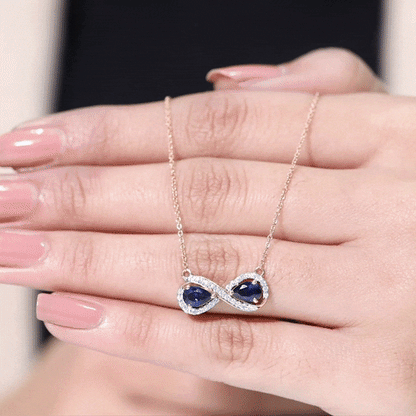 Lab Grown Blue Sapphire Infinity Necklace With Diamond Accent