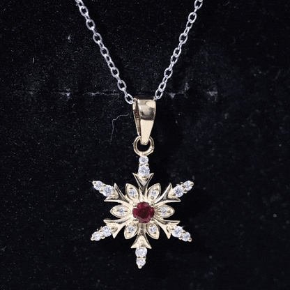 Lab Created Ruby Snowflake Pendant with Diamond Accent