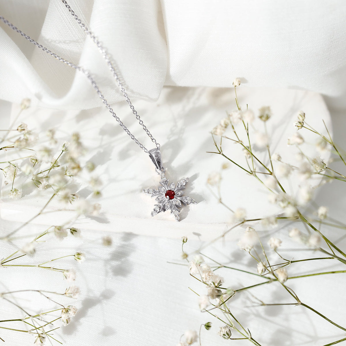 Lab Created Ruby Snowflake Pendant with Diamond Accent