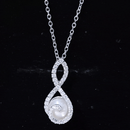 Freshwater White Pearl and Moissanite Infinity Pendant in Silver