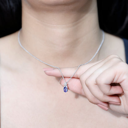 Oval Shaped 1 Carat Tanzanite Pendant Necklace with Diamond Flower