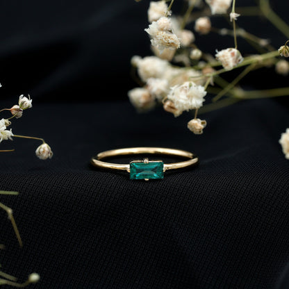 East West Set Baguette Cut Emerald May Birthstone Ring