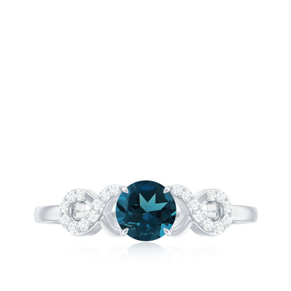 0.6 Carat Round London Blue Topaz Engagement Ring with Criss Cross Diamond