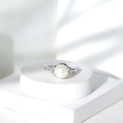 Natural 7.4 Carat Freshwater Pearl Engagement Ring with Diamond Trio