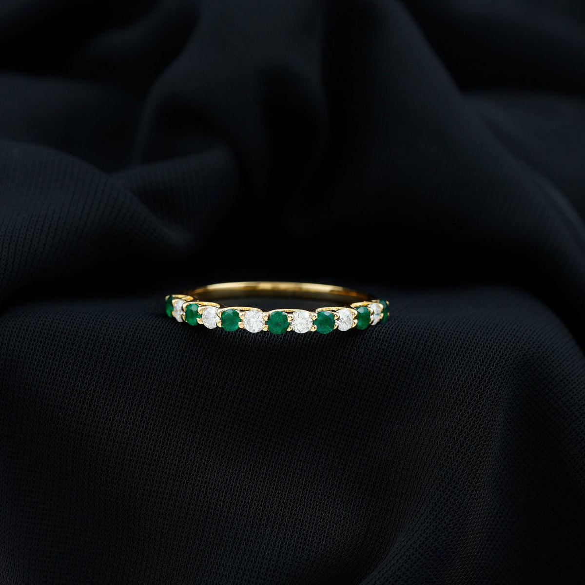 Trellis Set Round Emerald and Diamond Half Eternity Ring