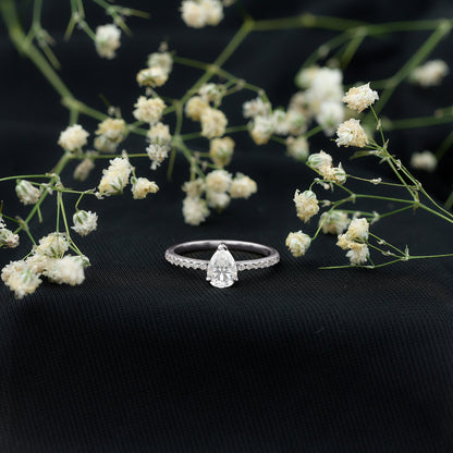 0.6 Carat Pear Cut Man Made Diamond Engagement Ring