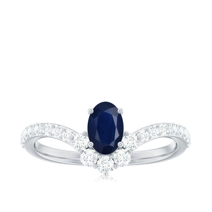 0.6 Carat Oval Cut Blue Sapphire and Diamond Chevron Ring