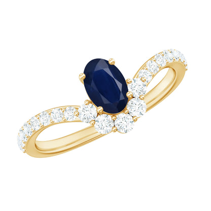 0.6 Carat Oval Cut Blue Sapphire and Diamond Chevron Ring