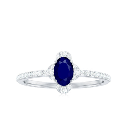 Natural 0.6 Carat Blue Sapphire Oval Engagement Ring with Diamond