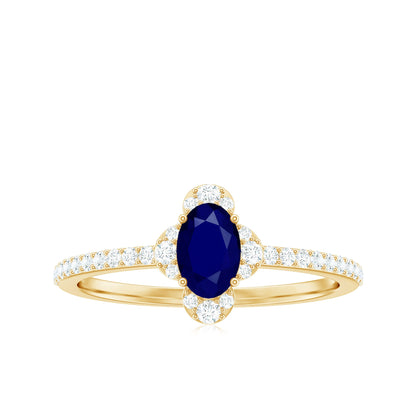 Natural 0.6 Carat Blue Sapphire Oval Engagement Ring with Diamond