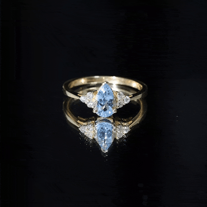 1 Carat Aquamarine Pear Engagement Ring with Diamond Trio