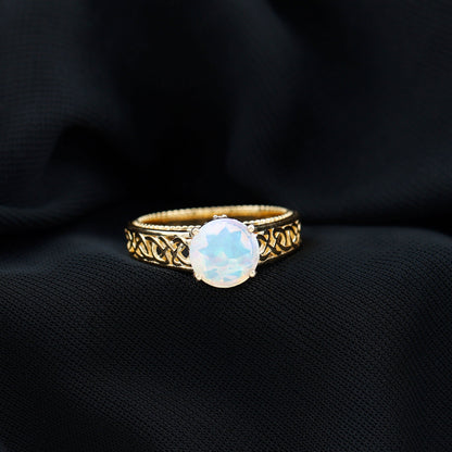 Ethiopian Opal Celtic Knot Engagement Ring with Surprise Diamond