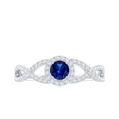 Certified 0.6 Carat Lab Grown Blue Sapphire Crossover Engagement Ring with Diamond