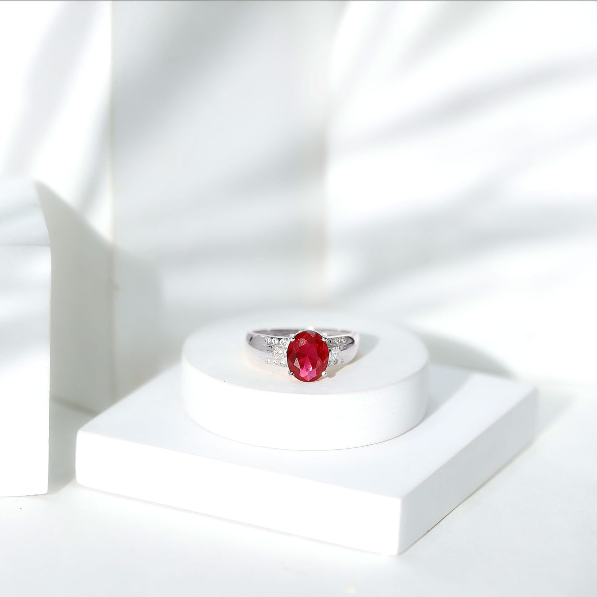 Oval Lab Grown Ruby Statement Engagement Ring with Diamond