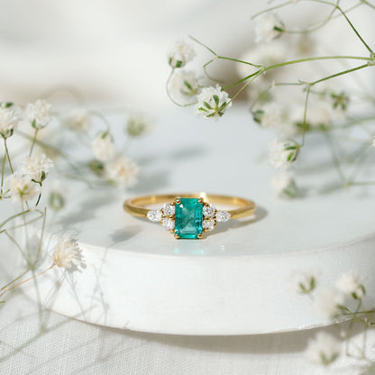 Emerald Cut Emerald Engagement Ring with Diamond Trio