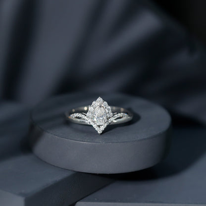 Designer 0.79 Carat Pear Shaped Moissanite Engagement Ring