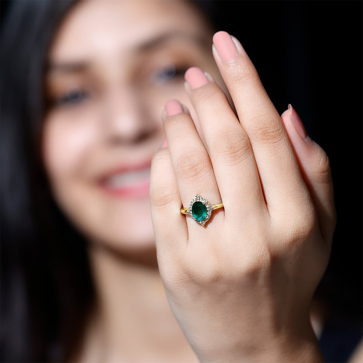 Vintage Looking Emerald Oval Engagement Ring with Diamond Halo