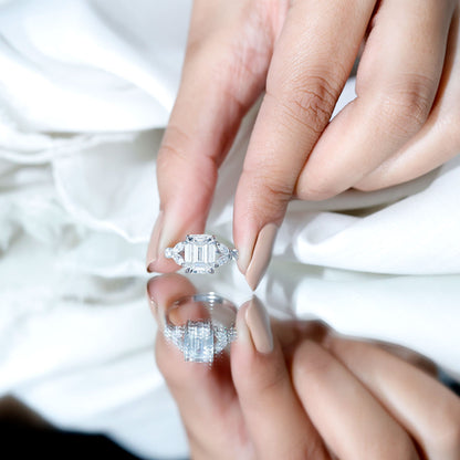 Claw Set Emerald Cut Moissanite Designer Engagement Ring