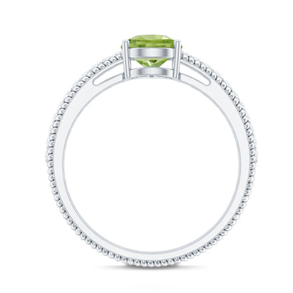 Natural 1 Carat Pear Shaped Peridot Engagement Ring with Diamond