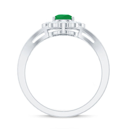 0.6 Carat Pear Cut Emerald Engagement Ring with Diamond Halo