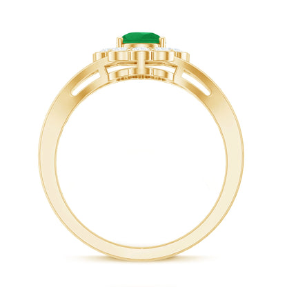0.6 Carat Pear Cut Emerald Engagement Ring with Diamond Halo