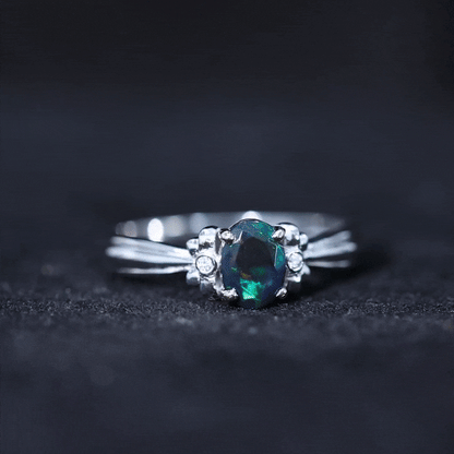 0.9 Carat Oval Cut Black Opal Solitaire Engagement Ring with Diamond