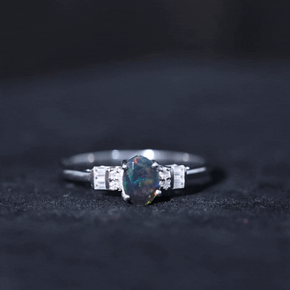 0.9 Carat Oval Cut Black Opal Engagement Ring with Diamond