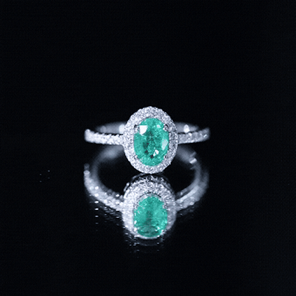 Real 0.7 Carat Oval Emerald Engagement Ring with Diamond Halo