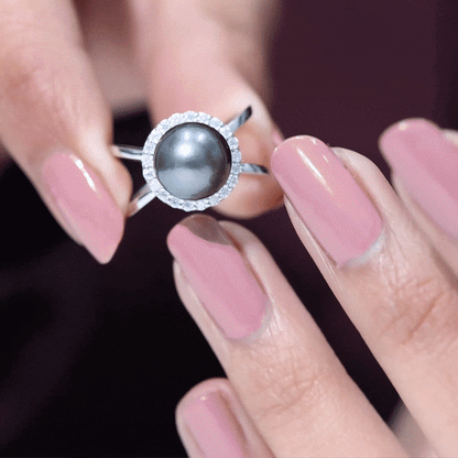 7.5 Carat Black Pearl Criss Cross Engagement Ring with Diamond Halo