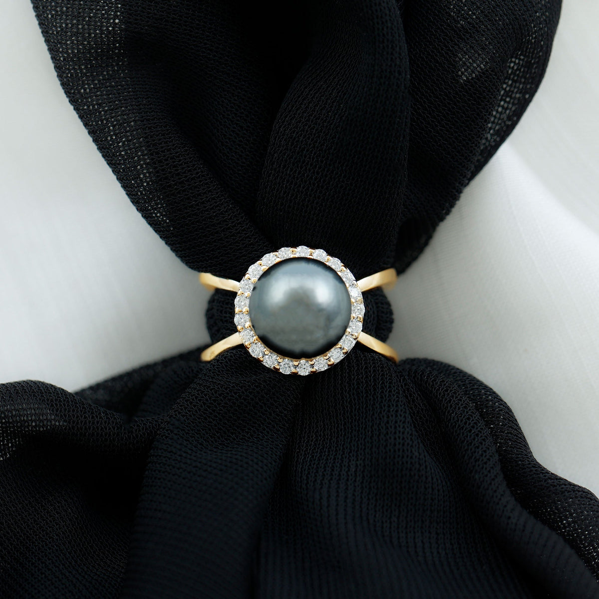 7.5 Carat Black Pearl Criss Cross Engagement Ring with Diamond Halo