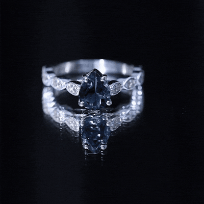 1 Carat Pear Shaped London Blue Topaz Teardrop Engagement Ring with Diamond