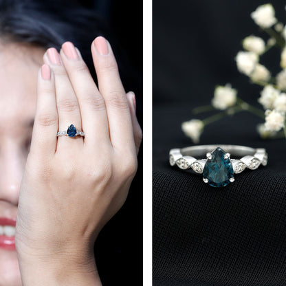 1 Carat Pear Shaped London Blue Topaz Teardrop Engagement Ring with Diamond