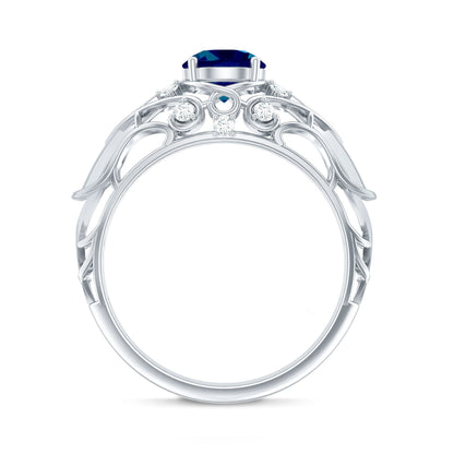 1.3 Carat Round London Blue Topaz Vintage Looking Engagement Ring with Diamond