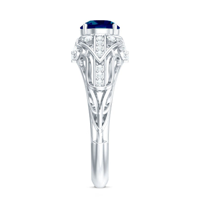 1.3 Carat Round London Blue Topaz Vintage Looking Engagement Ring with Diamond