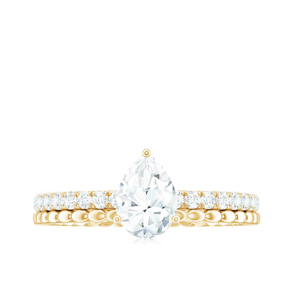 0.7 Carat Pear Cut Moissanite Solitaire Engagement Ring