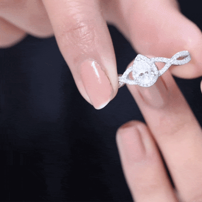 Pear Shaped Moissanite Crossover Engagement Ring with Halo