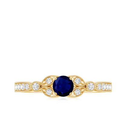 Vintage Inspired Blue Sapphire and Diamond Engagement Ring with Milgrain Details