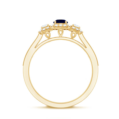 Vintage Inspired Blue Sapphire 3 Stone Engagement Ring with Diamond