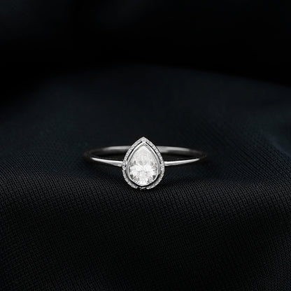 Pear Shaped Moissanite Solitaire Engagement Ring in Bezel Setting