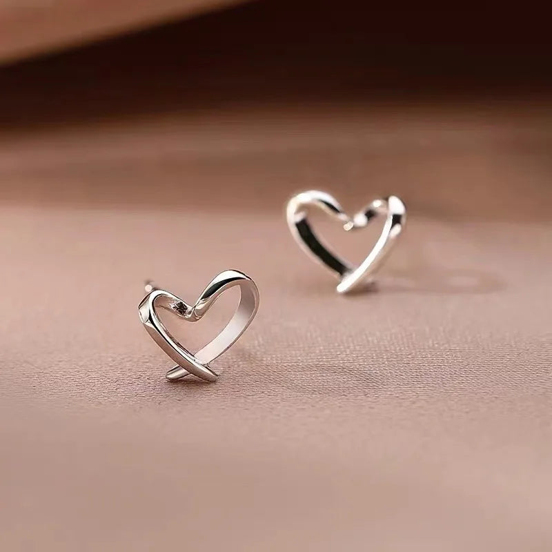 S925Silver Hollow out heart-shaped earrings for women, simple, light, luxurious, high-end, heart-shaped ins, high-end
